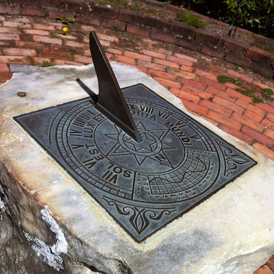 A sundial on a plinth.